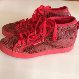 Red snake skin adidas with slight wedge